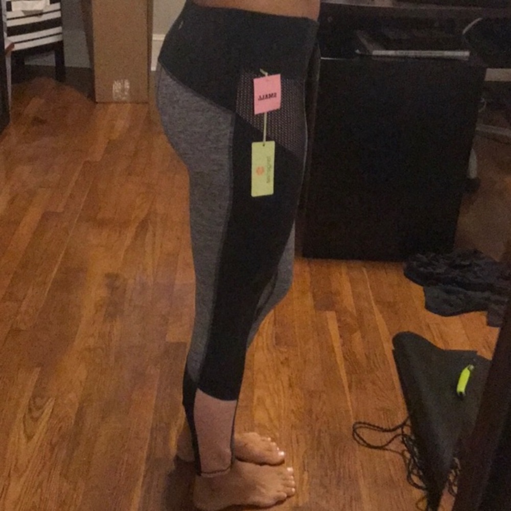 Grey activewear leggings w/ black & pink accents